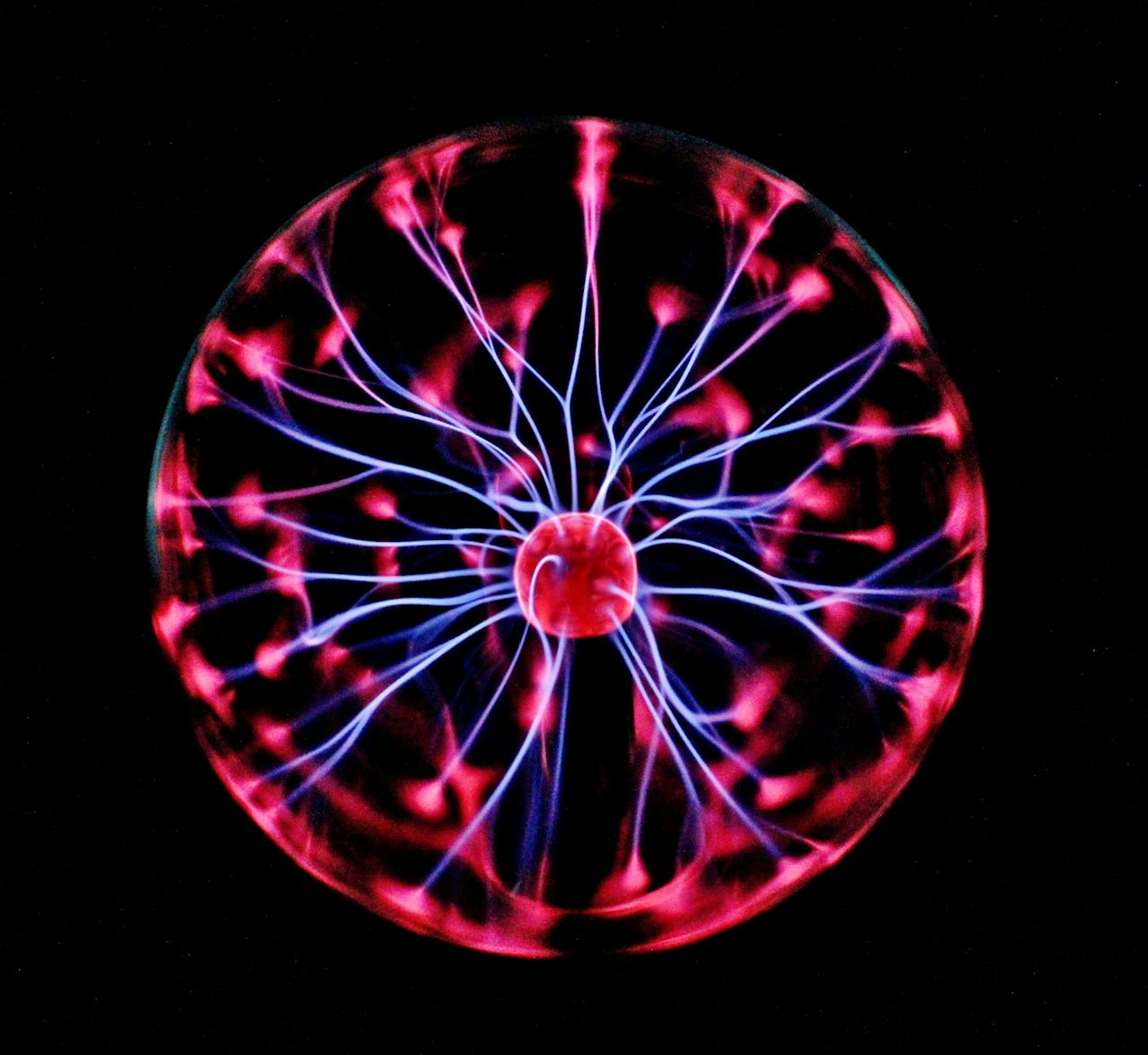 Mastering the First Impression: Your intriguing post title goes here Close-up of a plasma globe with vibrant neon sparks against a dark background.